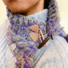 Hand crocheted purple and gray cable cowl with light tan toggle closure and pom poms on the corners hand made by MiasWorkshop