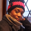 Handmade crocheted hot pink and black ear warmer or headband with two black buttons sewn onto the side by MiasWorkshop