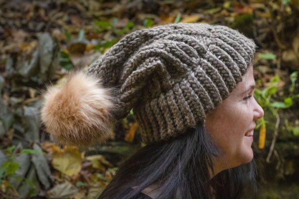 girl wearing taupe hand knit toboggan with tan pom pom adult sized from MiasWorkshop