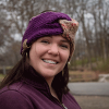 girl wearing violet and tan twisted ear warmer or headband from MiasWorkshop
